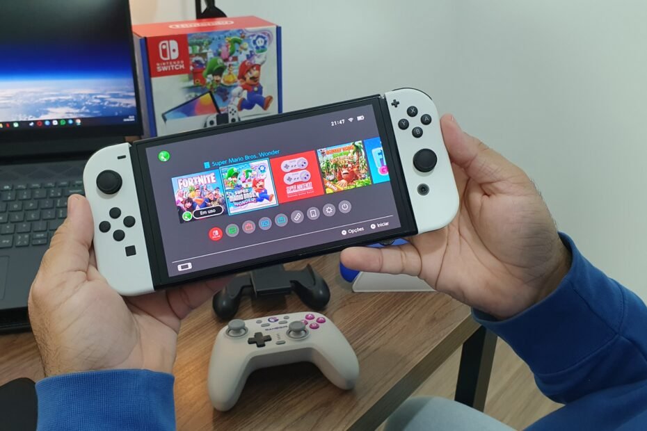 Descubra se o Nintendo Switch OLED ainda vale a pena em 2025. Review completo, pontos positivos, negativos e minha experiência de uso!